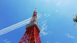 Aerobatics team fly over Tokyo Tower as Olympic Games get underway