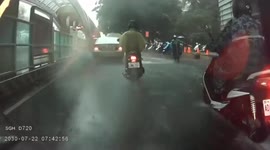 WTF MOMENTS: Moped riders riding through flooded streets and getting drenched by cars
