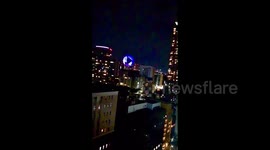 Spectacular drone view of the Tokyo Olympics opening ceremony illuminating over National Stadium