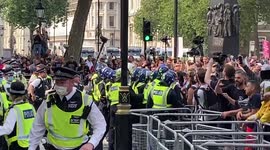 Anti-vaxxers scuffle with police outside Downing Street, London, UK