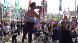 Sarah Jane Baker speaking as Reclaim Pride London protest paints Parliament Square in rainbow colours on 24 July 2021