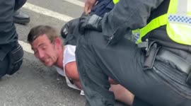 Anti-lockdown protesters in London hurl bottles at police
