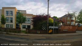 Dangerous overtake by a speeding driver on blind hill caught on dashcam