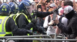 Clashes between protesters and police outside Downing Street at 'World Wide Rally For Freedom'