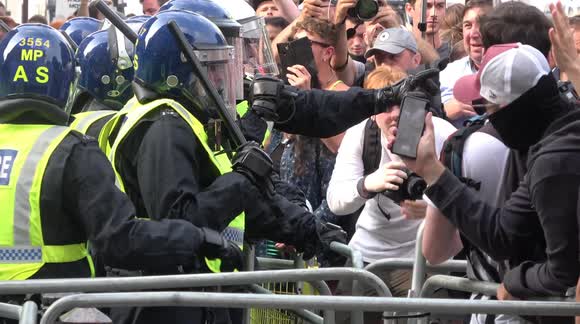 Clashes between protesters and police outside Downing Street at 'World Wide Rally For Freedom'