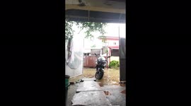 Stranded motorbike in flood