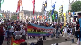 Reclaim Pride London participants demand a fight for human rights at Parliament Square on 24 July 2021 - London