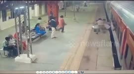 Man gets stuck between pavement and train tracks while attempting a risky jump
