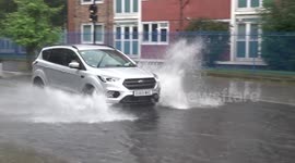 Roads turn into rivers in east London's Hackney as heatwave comes to dramatic end