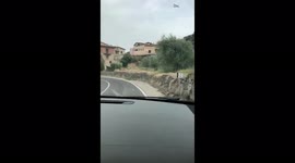 Italy: Smoke Caused By Massive Brush Fire Fills The Sardinia Island Sky