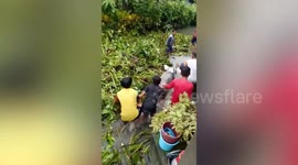 Families flee typhoon In-fa floods in the Philippines