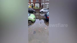 Roads flooded after heavy rain in London