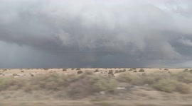 On a road trip in New Mexico we ran into a sever storm, but the strangest thing was what I captured inside the clouds of the storm.