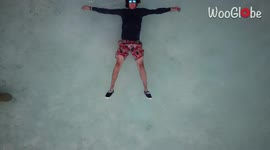 'Flawless Drone Cam Footage of Man Surrounded by Sharks'