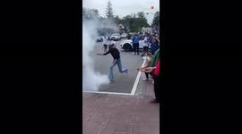 Motorcyclist tackled to ground by police after burning out his bike