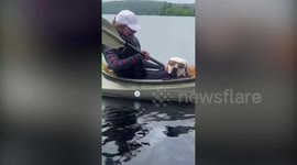 Cool pup loves loves nothing more than hitching a ride on his owners’ kayak in US