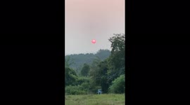 Surreal sun in Connecticut from western wildfires