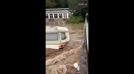 Camper van reduced to rubble as it smashes into bridge amid Swiss floods