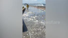 Plastic garbage covers Manila bay after heavy downpour brought by typhoon In-fa in the Philippines