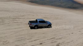 Drone video - mitsubishi l200 4x4 on jericoacoara beach - brazil