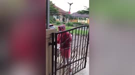 Worker falls into manhole while disinfecting village for Covid-19 in Indonesia