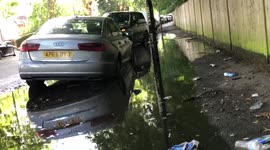 Flooding London Car submerged in water in Hamsptead North London