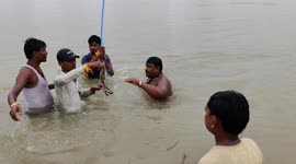 The Priest has practice of catching snakes on the day of Nagpanchami