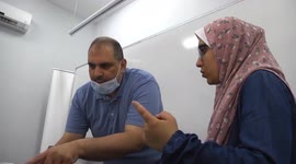 A Palestinian woman in Gaza Strip designs smart glasses for hearing disabilities.