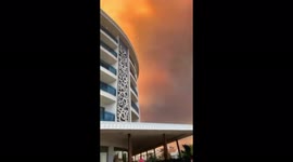 Orange-tinged clouds shroud southern Turkey as wildfires continue to burn