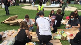 At Place des Vosges in Paris, France volunteers set up tents for the homeless