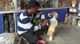 Sculptor creates piggy banks that take form of Indian Prime Minister Modi