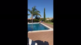 Teenager falls over in epic swimming pool fail