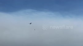 Airplane carrying water spotted in Serik, Turkey, as forest fire continues