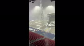 Concert-goers shelter from heavy rain showers at Nissan Stadium, Tennessee