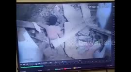 Shocking CCTV footage shows moment wall collapses inside Indian prison leaving 22 injured
