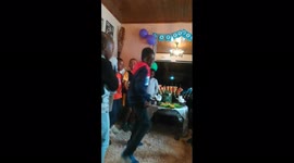 Happy birthday dance for a piece of cake, it's between birthday boy and friends...