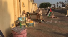 Two Gazan Artists Open a Fast Food Kiosk on Street Bank in Rafah .