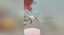 Powerful winds rip off roofs and damage houses in northern China