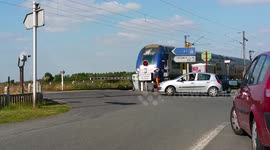 French drivers cross closed level crossing