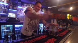 Bartender tries to serve drinks while being electrocuted
