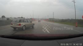 Car crash followed by near-miss in US rain