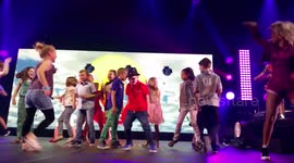 Boy's amazing dancing onstage at Pharrell gig