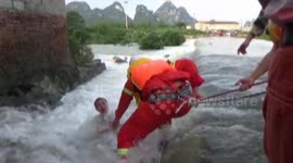 Man rescued from swollen river in China