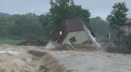 Houses washed away by huge China floods