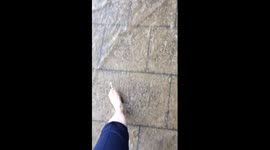 Walking through flood at London station