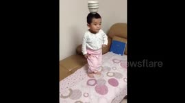Toddler's amazing balancing act