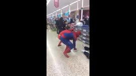 Superheroes in midnight Tesco fight in London, UK