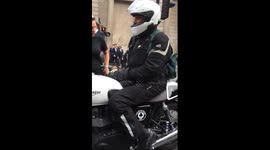 Motorcyclist refuses to stop engine during silence for dead cyclist