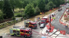 Water pumped from burst water main in south London, UK