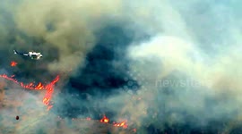 Aerial footage of helicopters over Sleepy Hollow fire